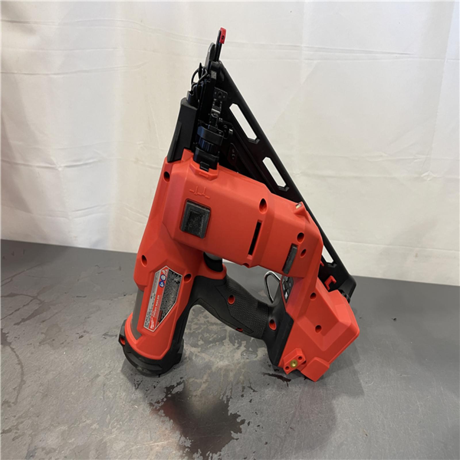 AS-IS - Milwaukee M18 FUEL 18-Volt Lithium-Ion Brushless Cordless Gen II 15-Gauge Angled Finish Nailer