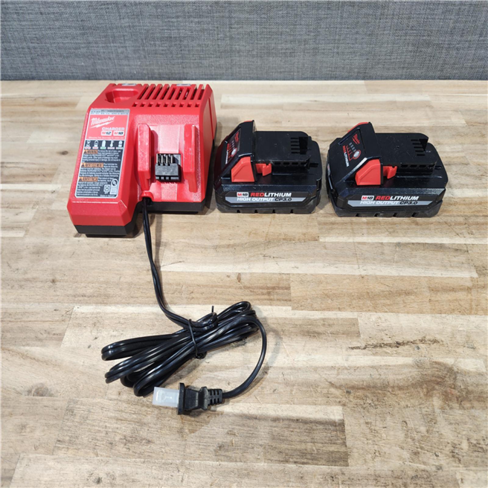 HOUSTON LOCATION - AS-IS MILWAUKEE 2 TOOL COMBO KIT W/ (2) BATTERY & CHARGER