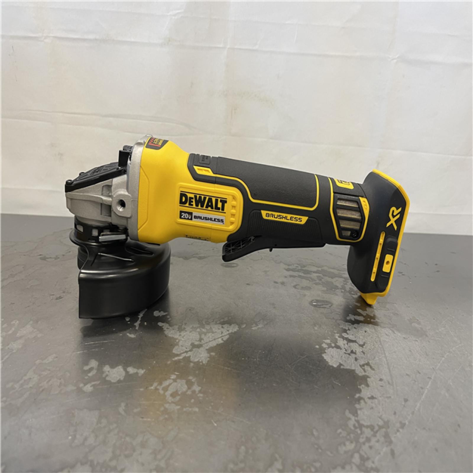 AS-IS- DeWalt 20-Volt MAX XR Cordless Brushless 4-1/2 in. Paddle Switch Small Angle Grinder (Tool-Only)