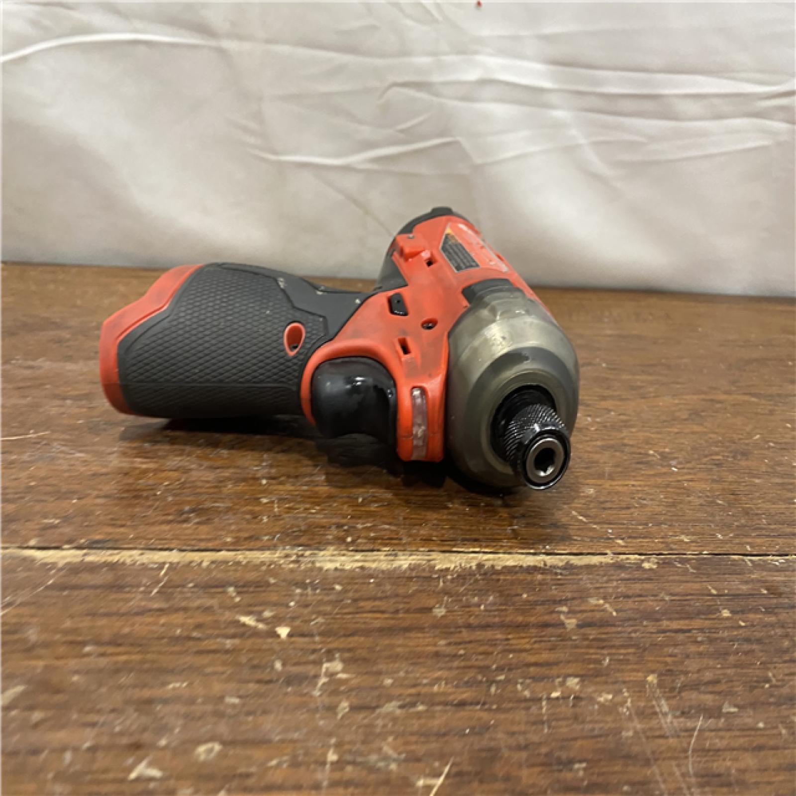 AS-IS M12 FUEL SURGE 12V Lithium-Ion Brushless Cordless 1/4 in. Hex Impact Driver Compact Kit W/Two 2.0Ah Batteries, Bag