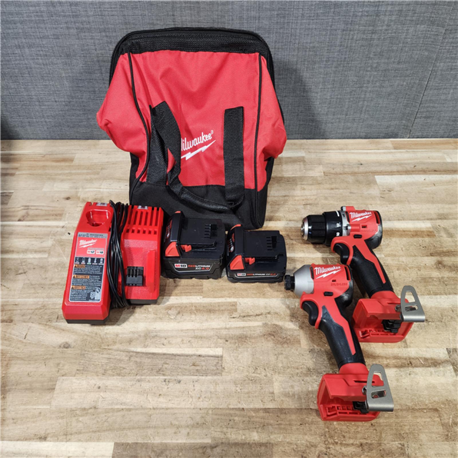 HOUSTON LOCATION - AS - IS Milwaukee 18-Volt Lithium-Ion Brushless Cordless Compact Hammer Drill/Impact Combo Kit