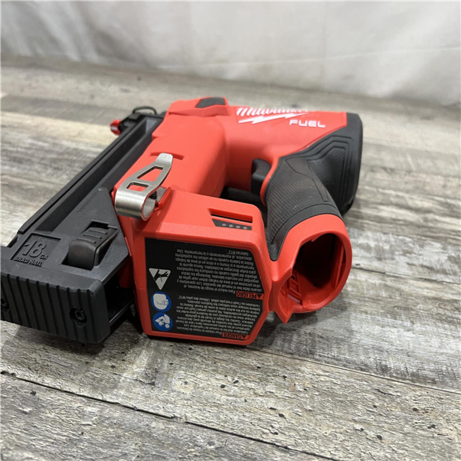 AS-IS Milwaukee FUEL 12-Volt Lithium-Ion Brushless Cordless 18-Gauge 1-1/2 in. Compact Brad Nailer (Tool Only)