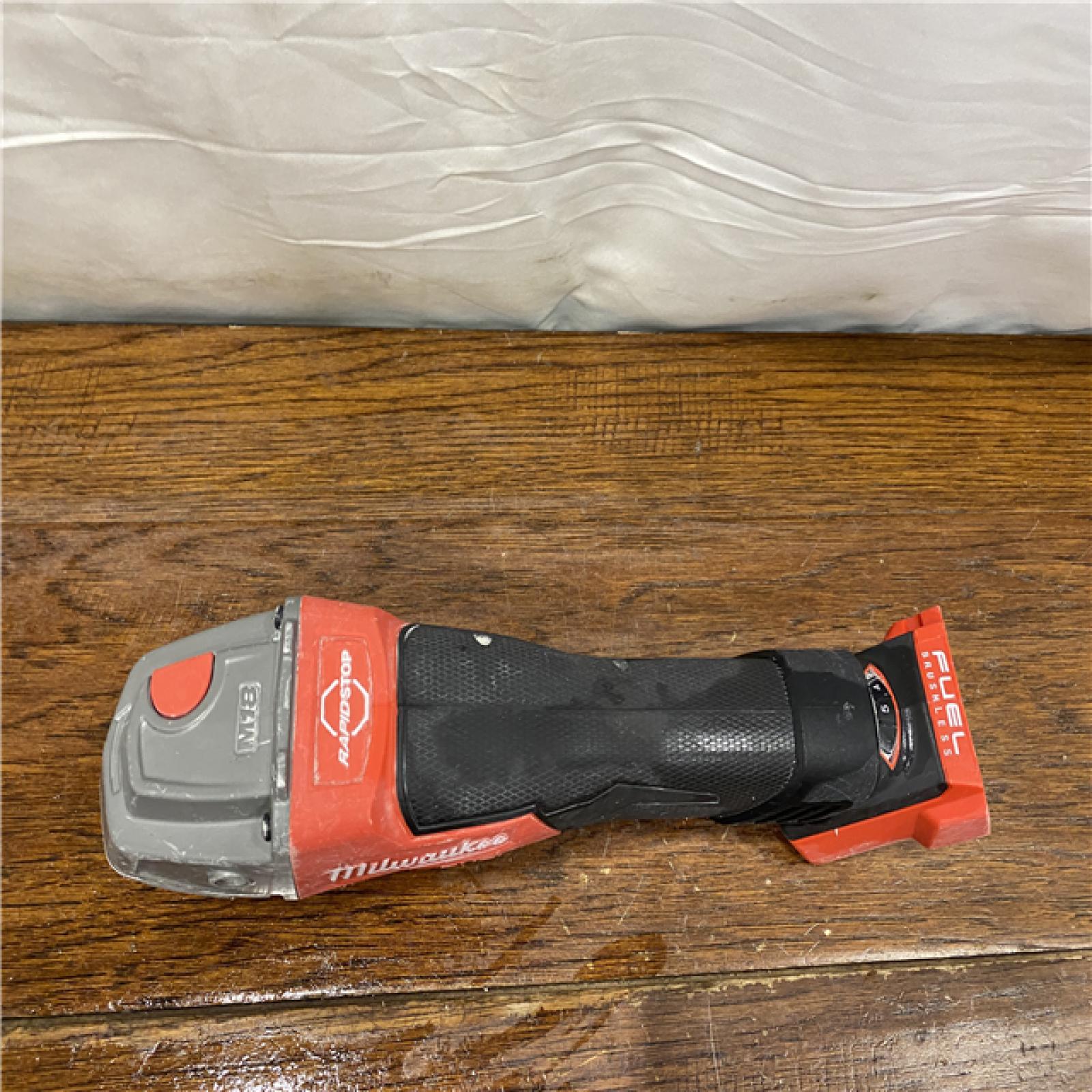 AS-IS M18 FUEL 18V Lithium-Ion Brushless Cordless 4-1/2 in./5 in. Grinder with Variable Speed & Paddle Switch (Tool-Only)
