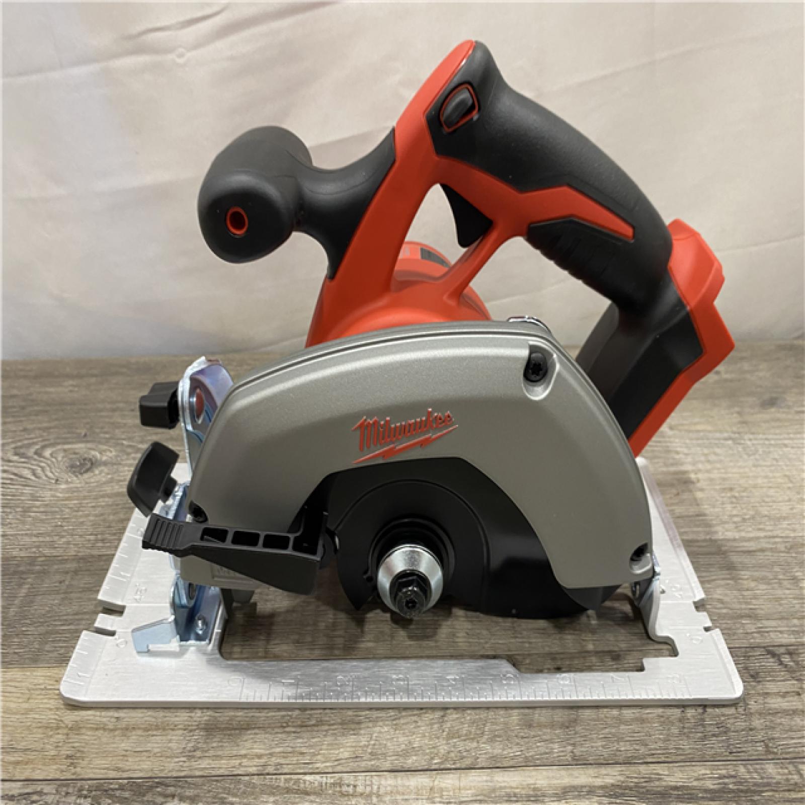 AS-IS Milwaukee 18V Lithium-Ion Cordless 6-1/2 in. Circular Saw (Tool-Only)