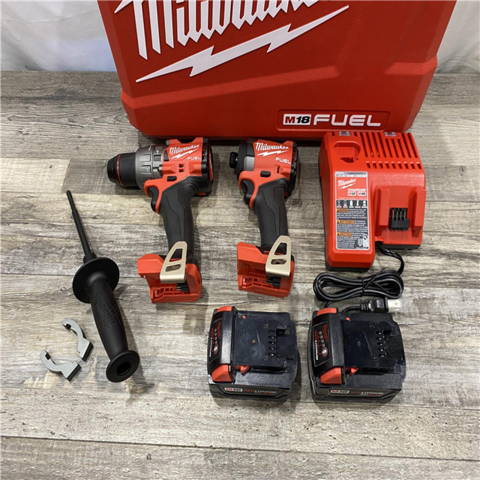 AS-IS Milwaukee FUEL 18V Lithium-Ion Brushless Cordless Hammer Drill and Impact Driver Combo Kit