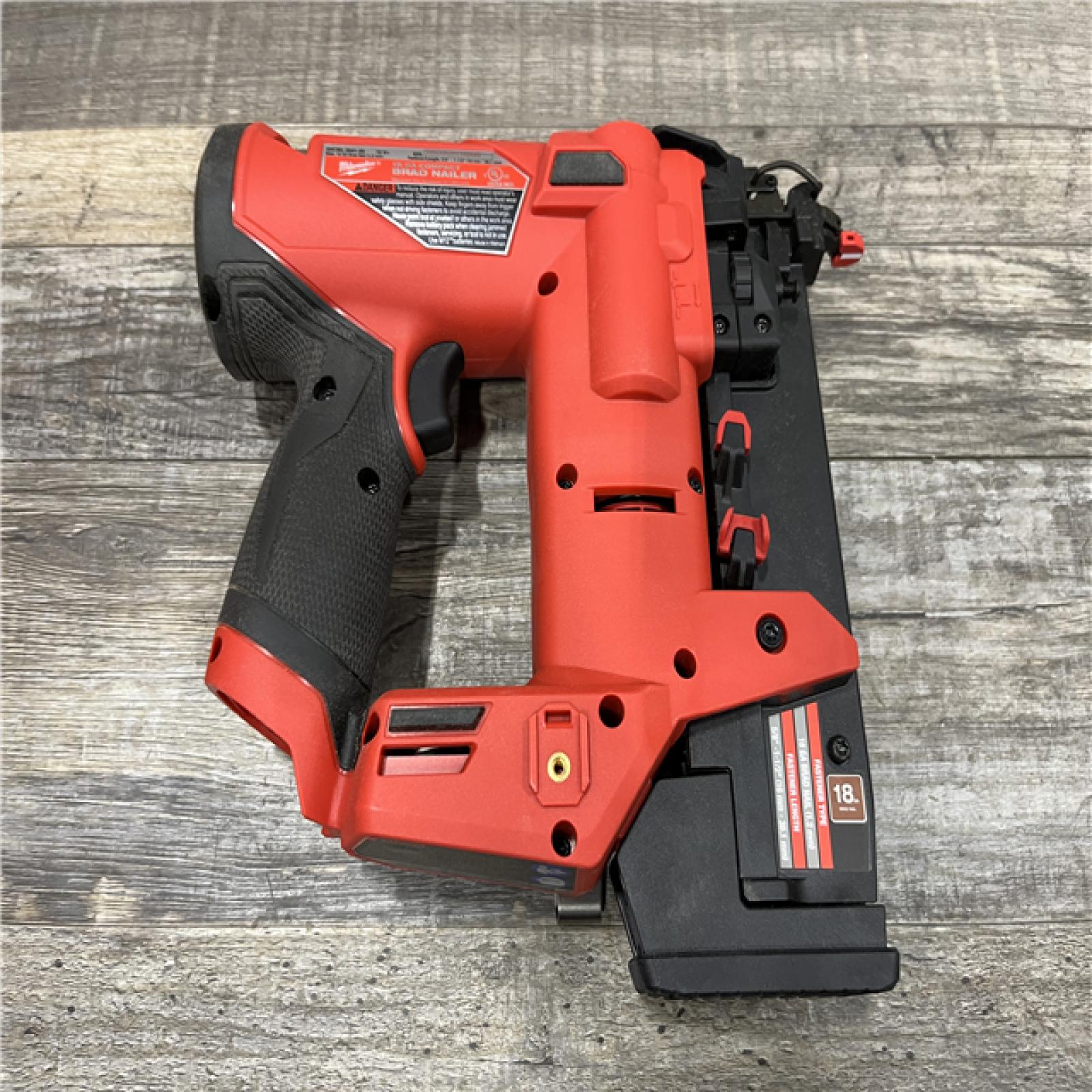 AS-IS Milwaukee FUEL 12-Volt Lithium-Ion Brushless Cordless 18-Gauge 1-1/2 in. Compact Brad Nailer (Tool Only)