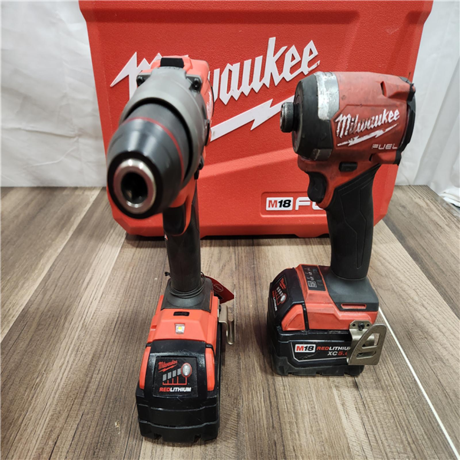 AS-IS MILWAUKEE FUEL 18V Lithium-Ion Brushless Cordless Hammer Drill and Impact Driver Combo Kit (2-Tool) with 2 Batteries