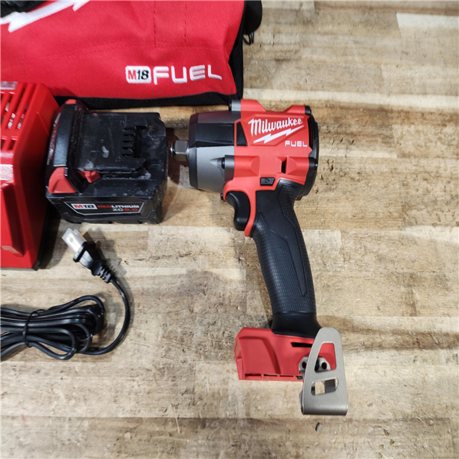 HOUSTON LOCATION - AS - IS Milwaukee FUEL Gen-2 18V Lithium-Ion Brushless Cordless Mid Torque 1/2 in. Impact Wrench w/Friction Ring COMBO KIT