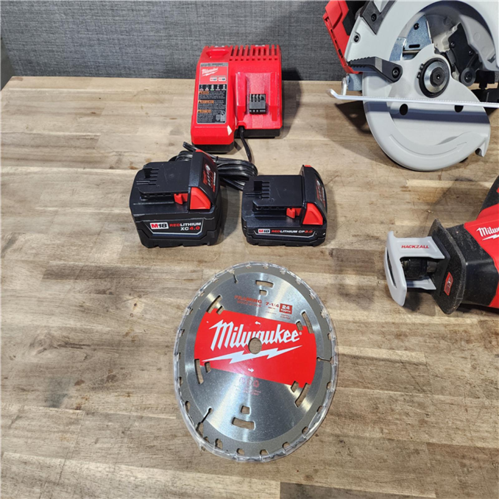 HOUSTON LOCATION - AS-IS Milwaukee M18 18-Volt Lithium-Ion Brushless Cordless Combo Kit (4-Tool) with 2-Batteries, 1-Charger