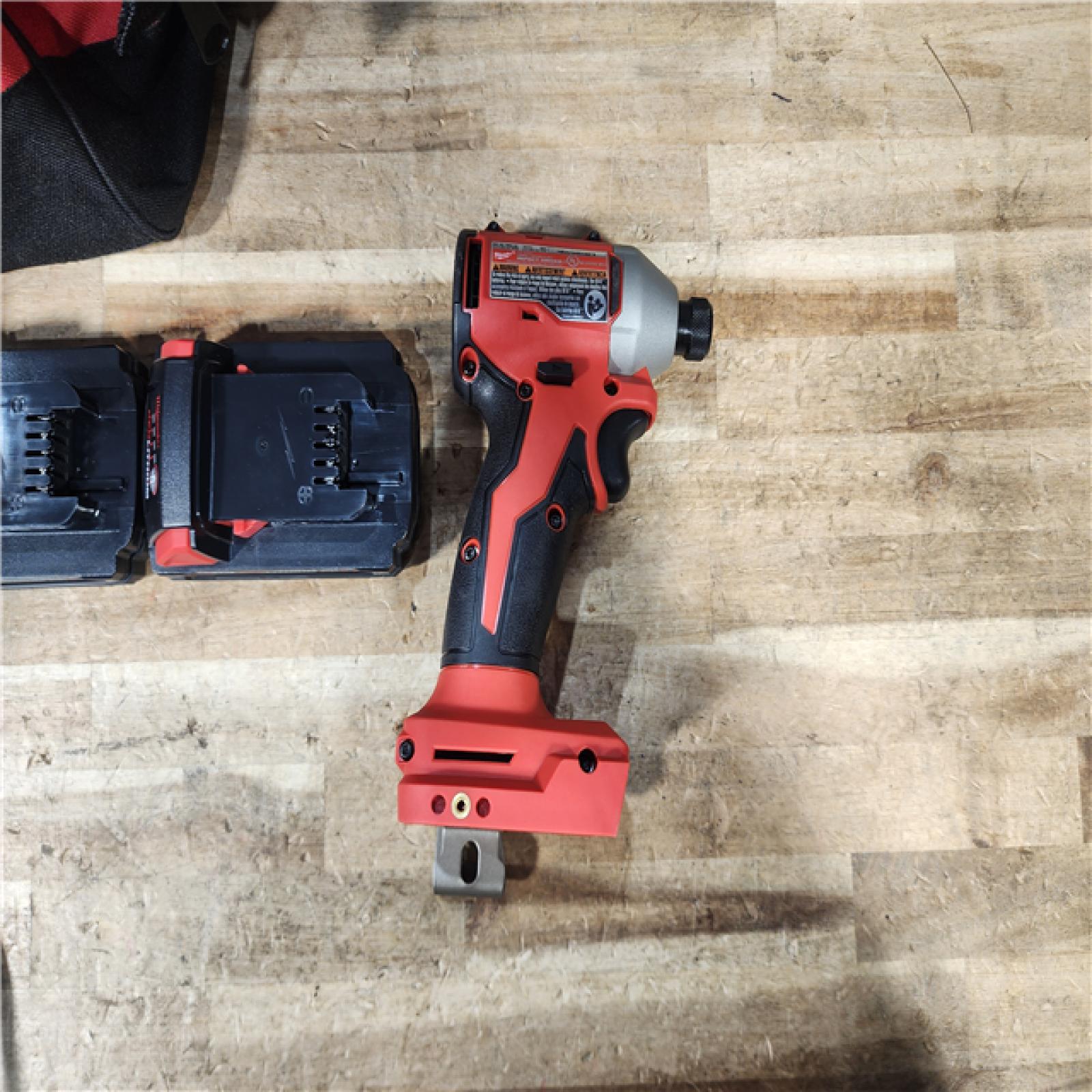 HOUSTON LOCATION - AS - IS Milwaukee 18-Volt Lithium-Ion Compact Brushless Cordless 1/4 in. Impact Driver Kit