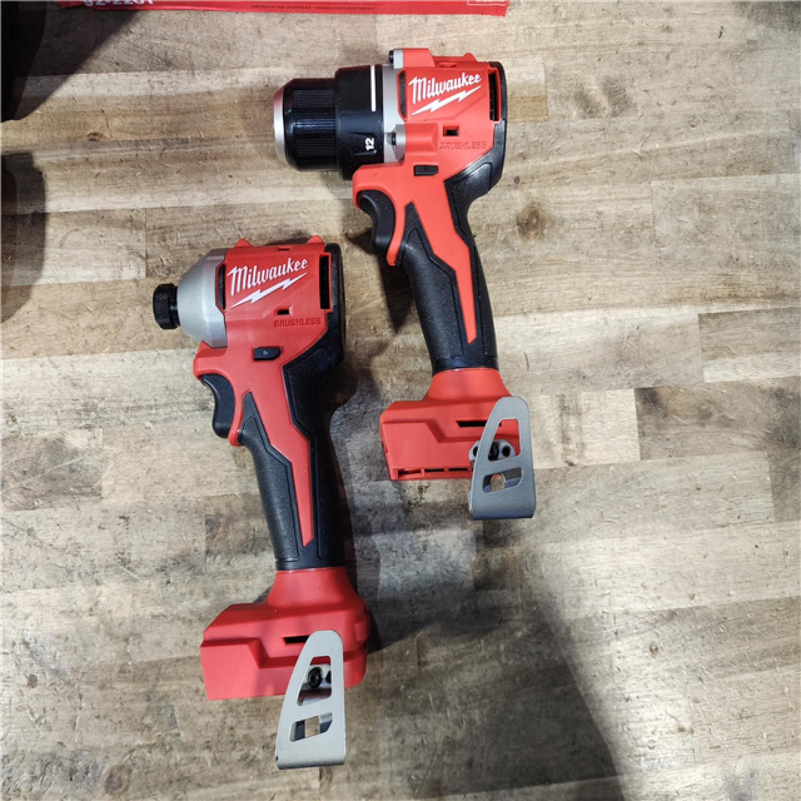 HOUSTON LOCATION - AS-IS Milwaukee M18 18V Lithium-Ion Brushless Cordless Compact Drill/Impact Combo Kit (2-Tool) W/(2) 2.0 Ah Batteries  Charger & Bag