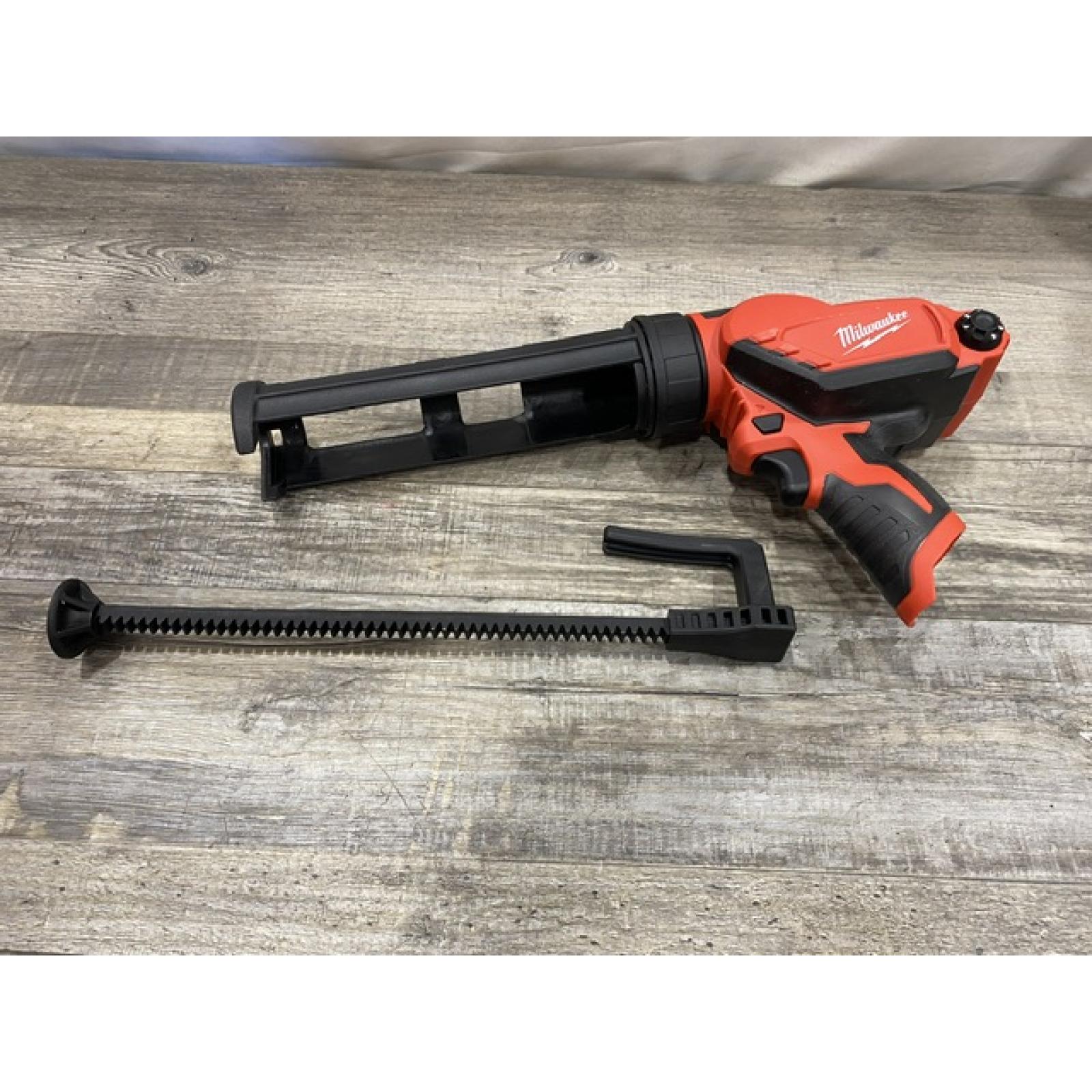 AS-IS Milwaukee 12V Lithium-Ion Cordless 10 oz. Adhesive and Caulk Gun (Tool-Only)