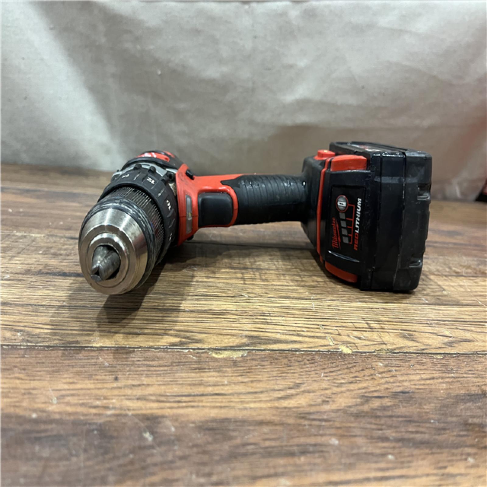 AS-IS MILWAUKEE M18 FUEL 18V Lithium-Ion Brushless Cordless Hammer Drill and Impact Driver Combo Kit (2-Tool) with 2 Batteries