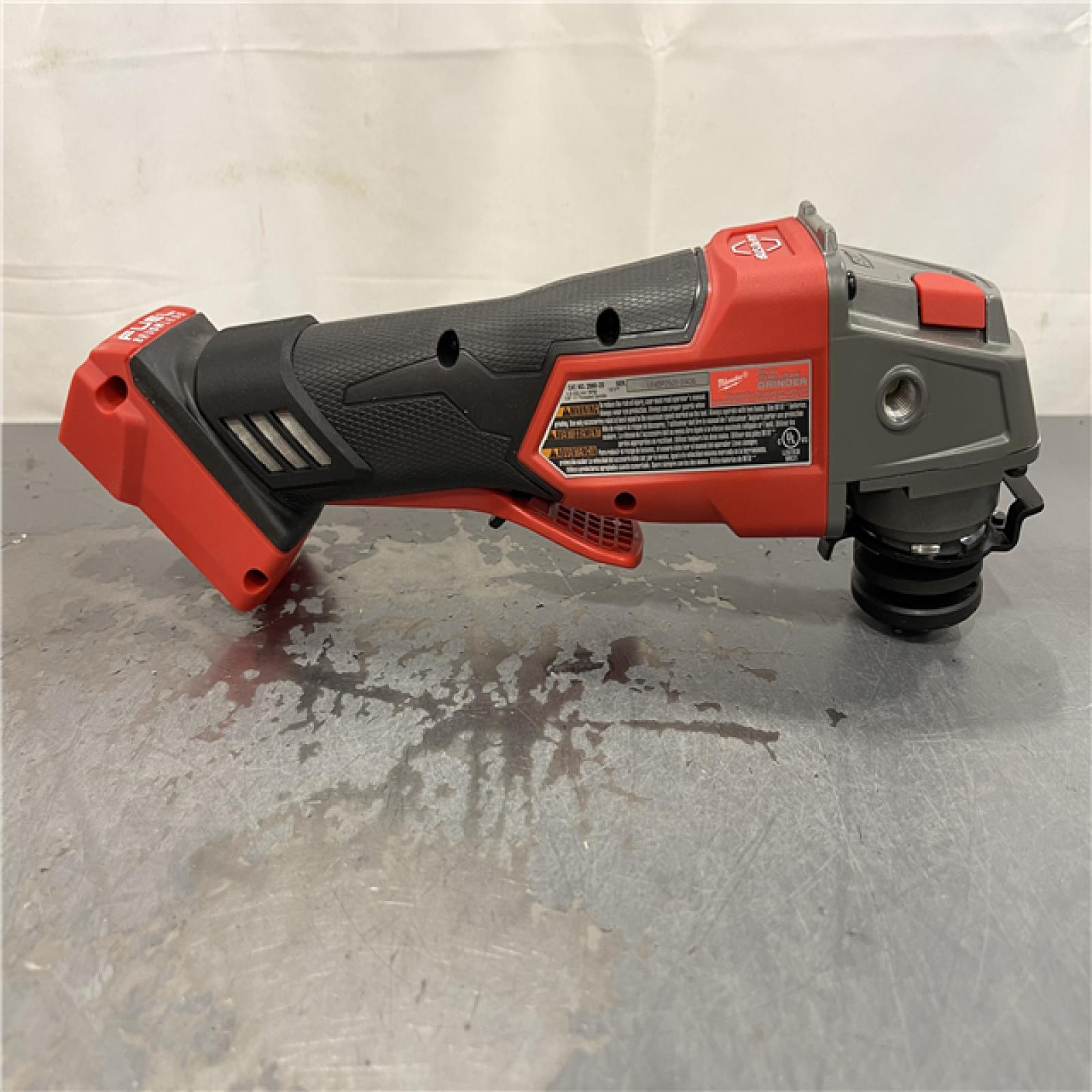 AS-IS - Milwaukee M18 FUEL 18V Lithium-Ion Brushless Cordless 4-1/2 in./5 in. Grinder w/Paddle Switch