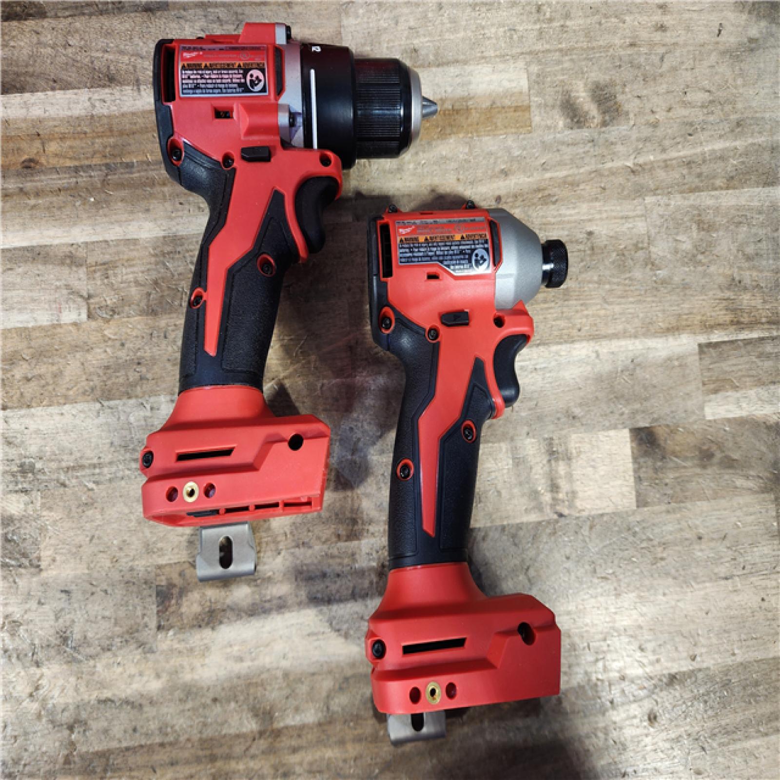 HOUSTON LOCATION - AS-IS Milwaukee M18 18V Lithium-Ion Brushless Cordless Compact Drill/Impact Combo Kit (2-Tool) W/(2) 2.0 Ah Batteries  Charger & Bag