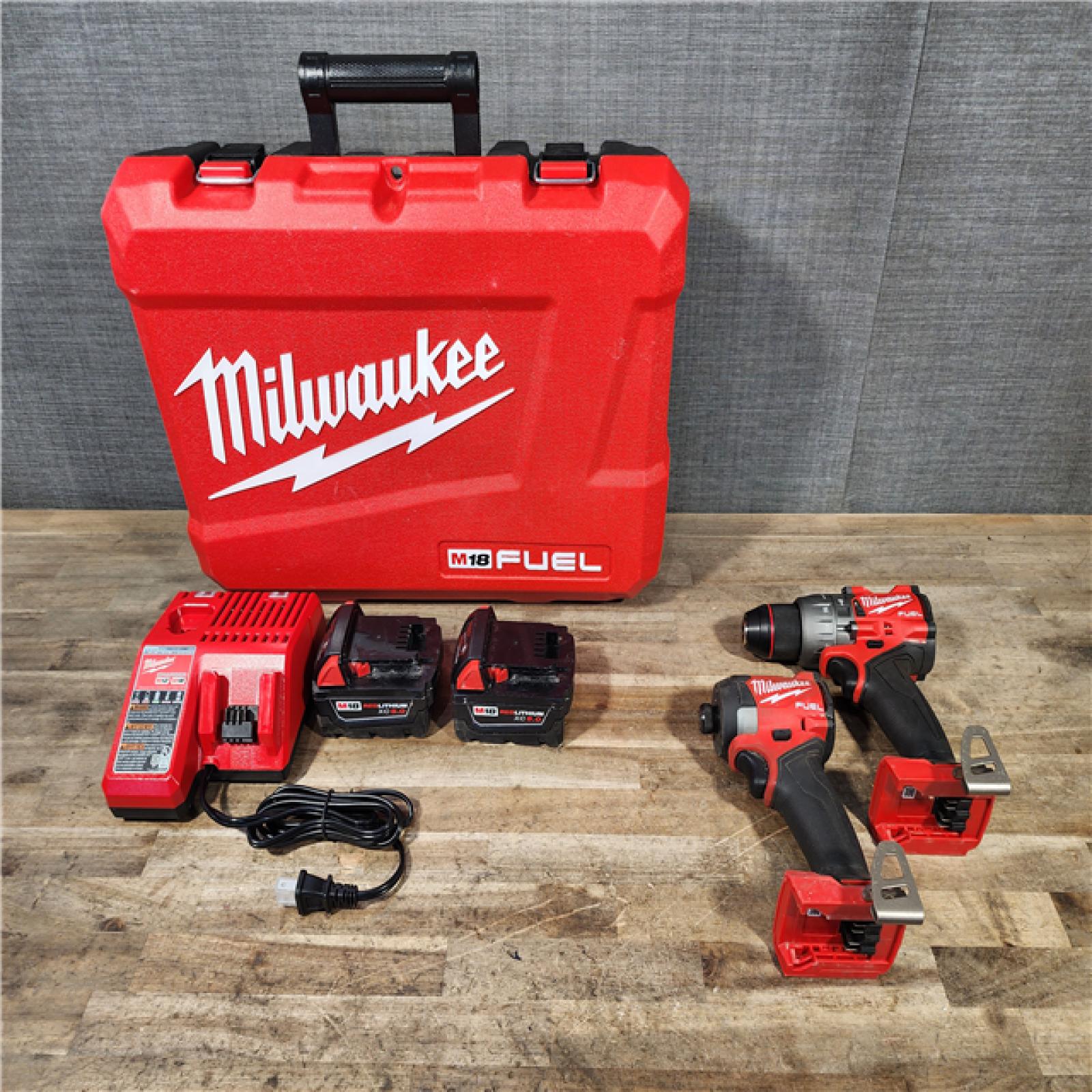 HOUSTON LOCATION - AS-IS Milwaukee FUEL 18V Lithium-Ion Brushless Cordless Hammer Drill and Impact Driver Combo Kit