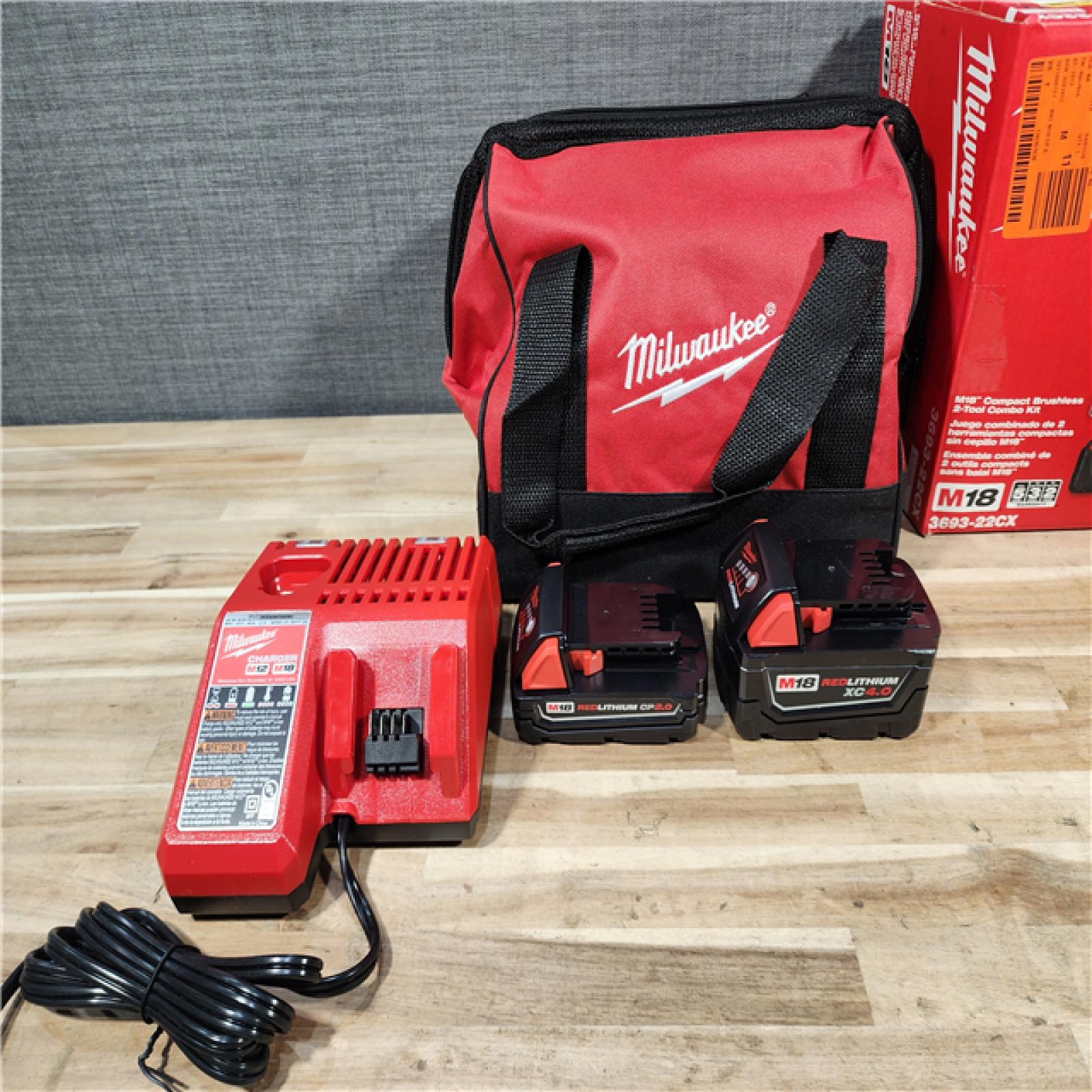 HOUSTON LOCATION - AS-IS (APPEARS LIKE NEW) Milwaukee 18-Volt Lithium-Ion Brushless Cordless Compact Hammer Drill/Impact Combo Kit