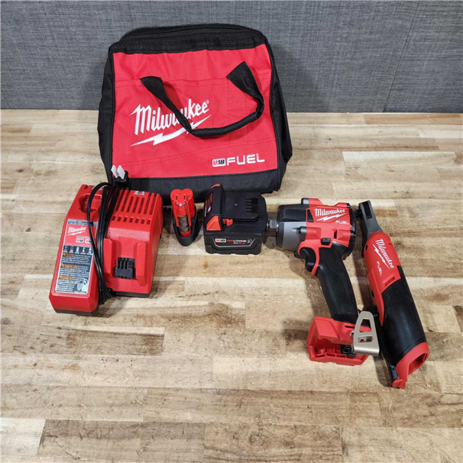 HOUSTON LOCATION - AS - IS M18 FUEL 18V Cordless Mid Torque 1/2 in. Impact Wrench W/ M12 FUEL 3/8 in. Ratchet & Battery/Charger Combo Kit