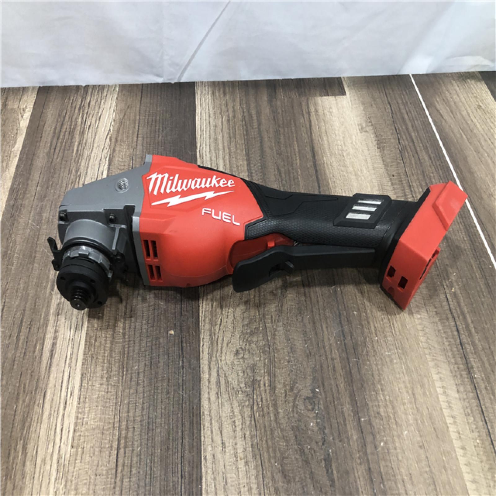 AS-IS Milwaukee FUEL 18-Volt Lithium-Ion Brushless Cordless 4-1/2 in./6 in. Braking Grinder with Paddle Switch (Tool-Only)