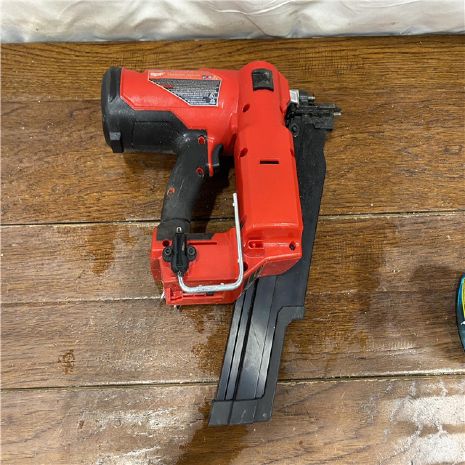 AS-IS Milwaukee 2744-20 M18 FUEL 3-1/2 in. 18-Volt 21-Degree Lithium-Ion Brushless Cordless Framing Nailer (Tool-Only)