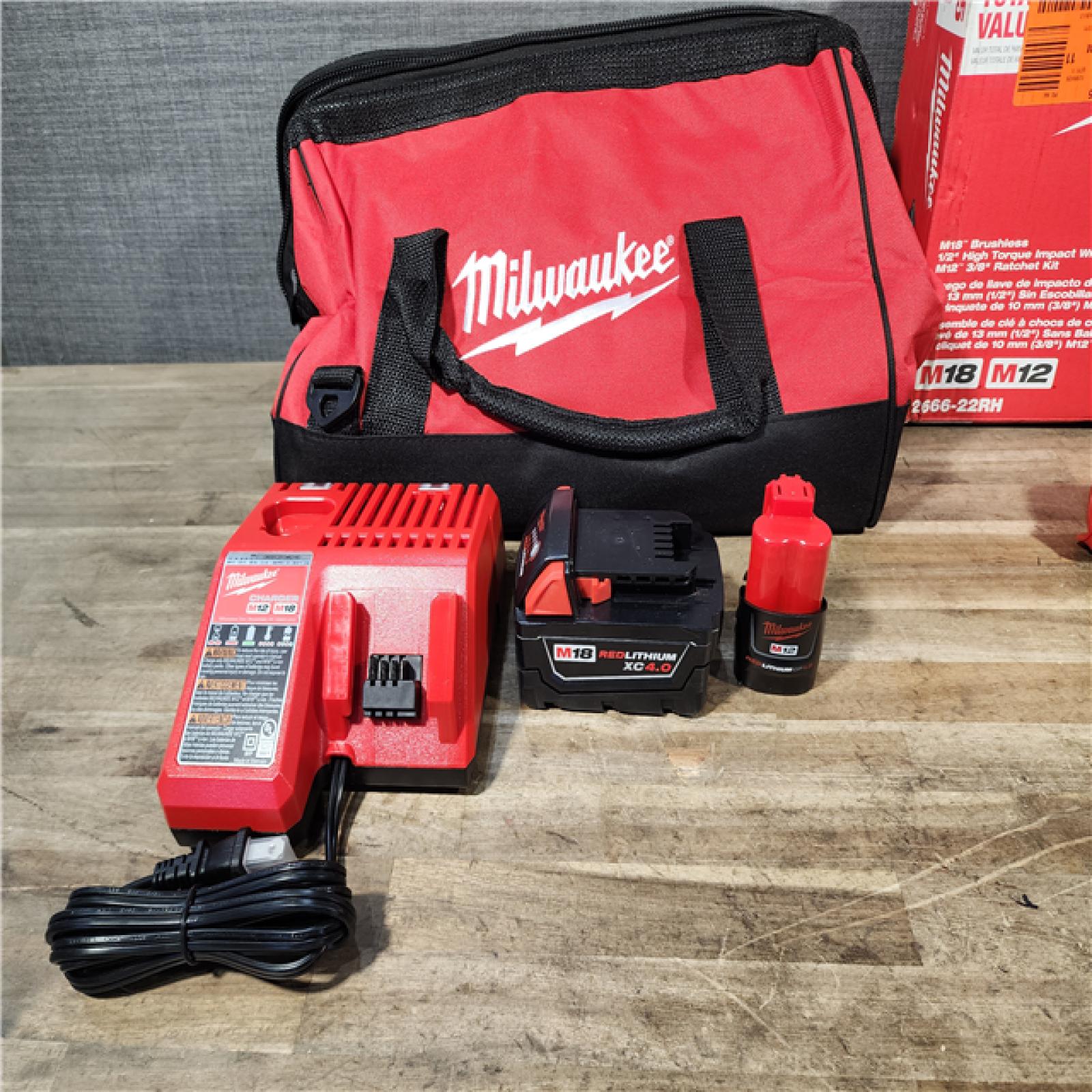 HOUSTON LOCATION - AS-IS Milwaukee 12/18V Lithium-Ion Cordless 3/8 in. Ratchet and 1/2 in. High Torque Impact Wrench with Friction Ring Combo Kit
