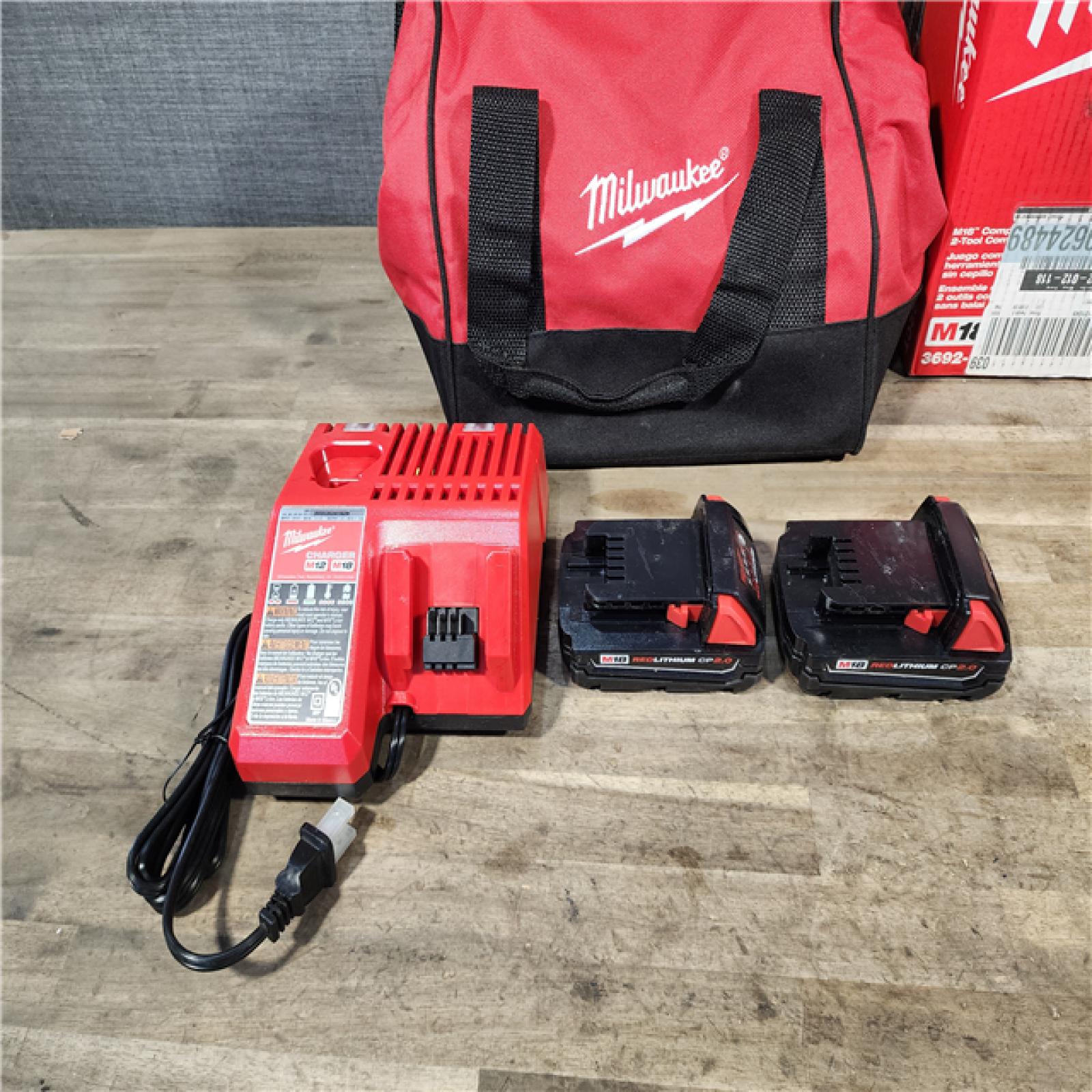 HOUSTON LOCATION - AS-IS Milwaukee M18 18V Lithium-Ion Brushless Cordless Compact Drill/Impact Combo Kit (2-Tool) W/(2) 2.0 Ah Batteries  Charger & Bag