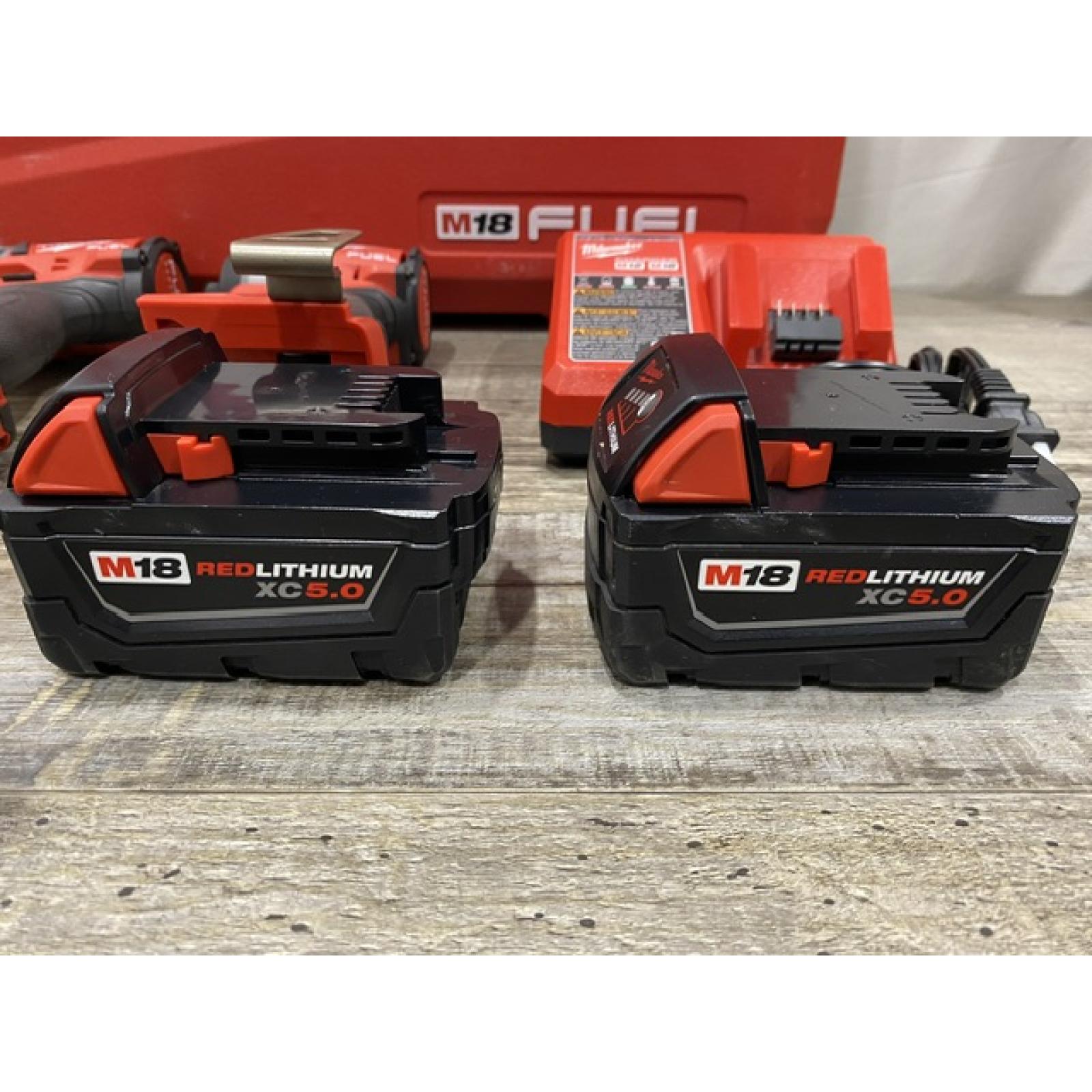 AS-IS Milwaukee FUEL 18V Lithium-Ion Brushless Cordless Hammer Drill and Impact Driver Combo Kit