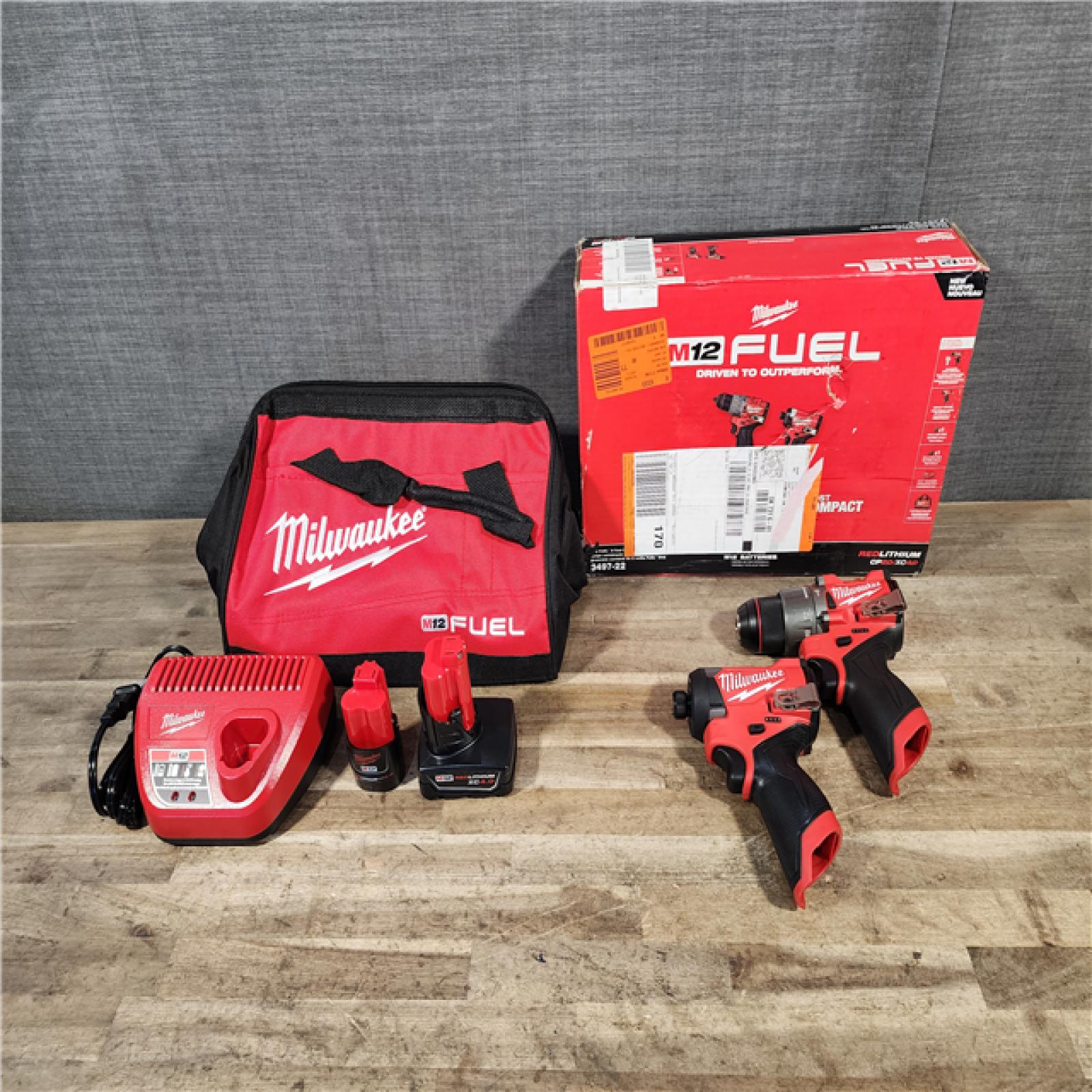 HOUSTON LOCATION - AS-IS (APPEARS LIKE NEW) Milwaukee FUEL 12-Volt Lithium-Ion Brushless Cordless Hammer Drill and Impact Driver Combo Kit