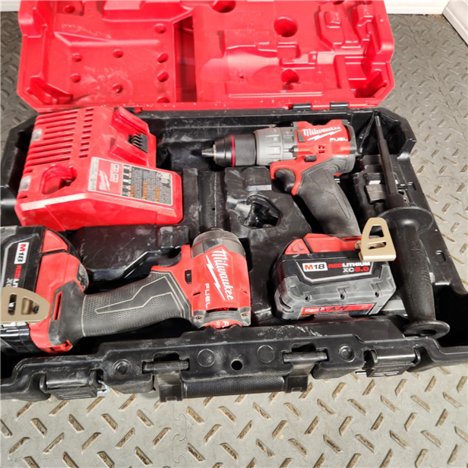 Houston location- AS-IS Milwaukee M18 Compact Brushless 2-Tool Combo Kit