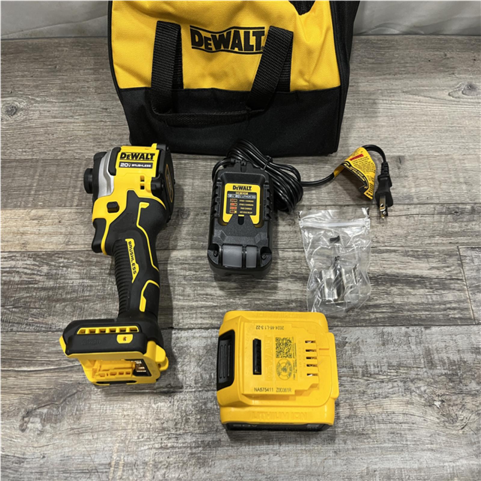 AS-IS DEWALT ATOMIC 20V MAX Lithium-Ion Cordless 1/4 in. Brushless Impact Driver Kit
