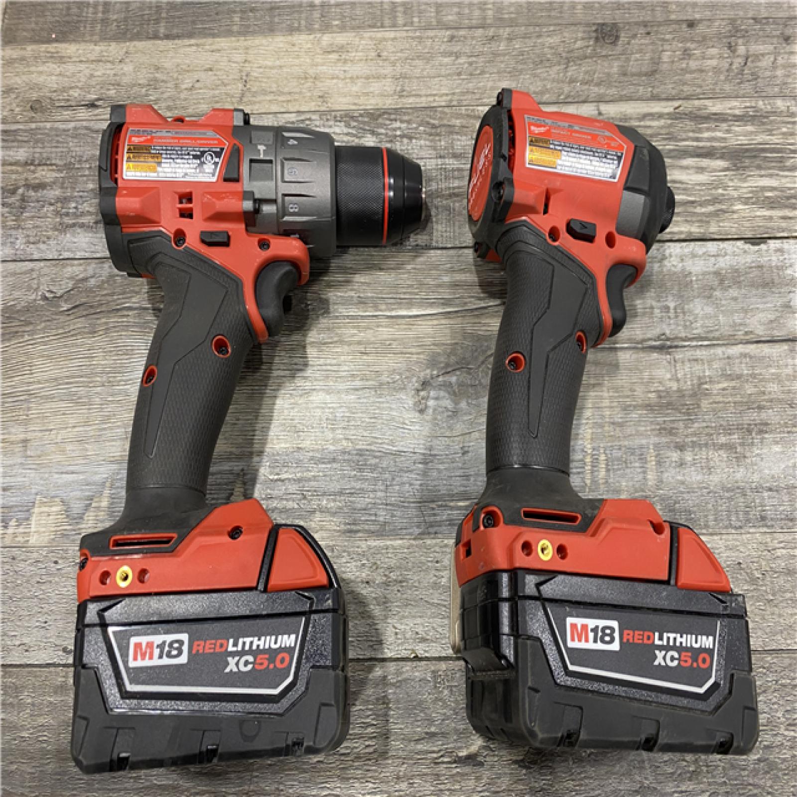 AS-IS Milwaukee FUEL 18V Lithium-Ion Brushless Cordless Hammer Drill and Impact Driver Combo Kit