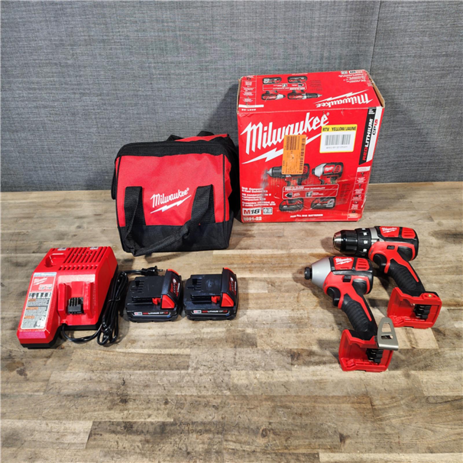 HOUSTON LOCATION - AS-IS Milwaukee 18V Cordless Brushed 2-Tool Drill/Driver and Impact Driver Kit