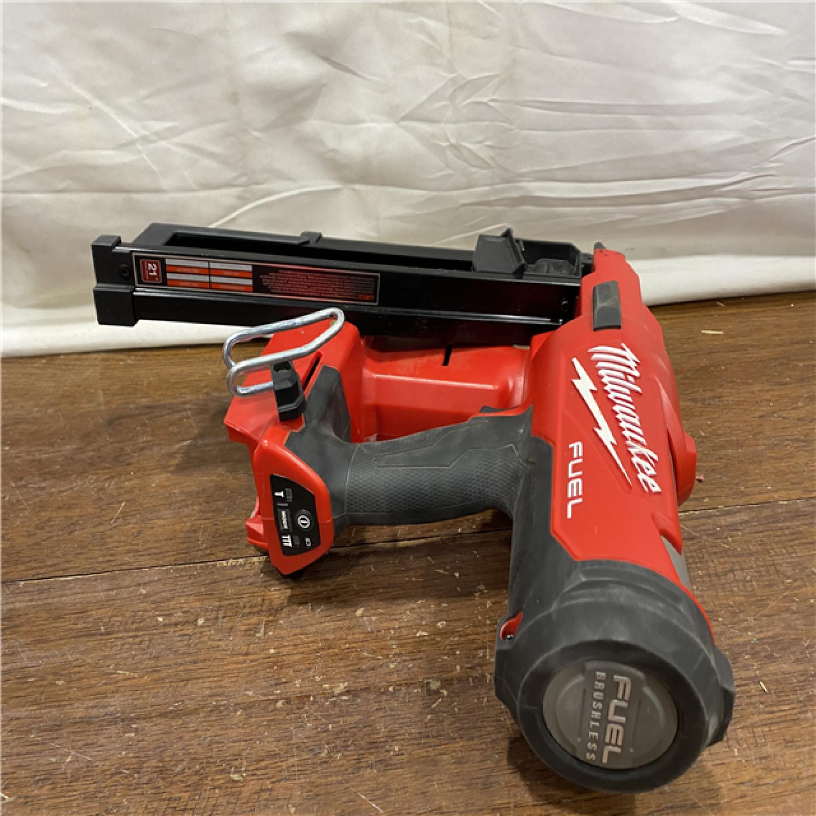 AS-IS Milwaukee 2744-20 M18 FUEL 3-1/2 in. 18-Volt 21-Degree Lithium-Ion Brushless Cordless Framing Nailer (Tool-Only)
