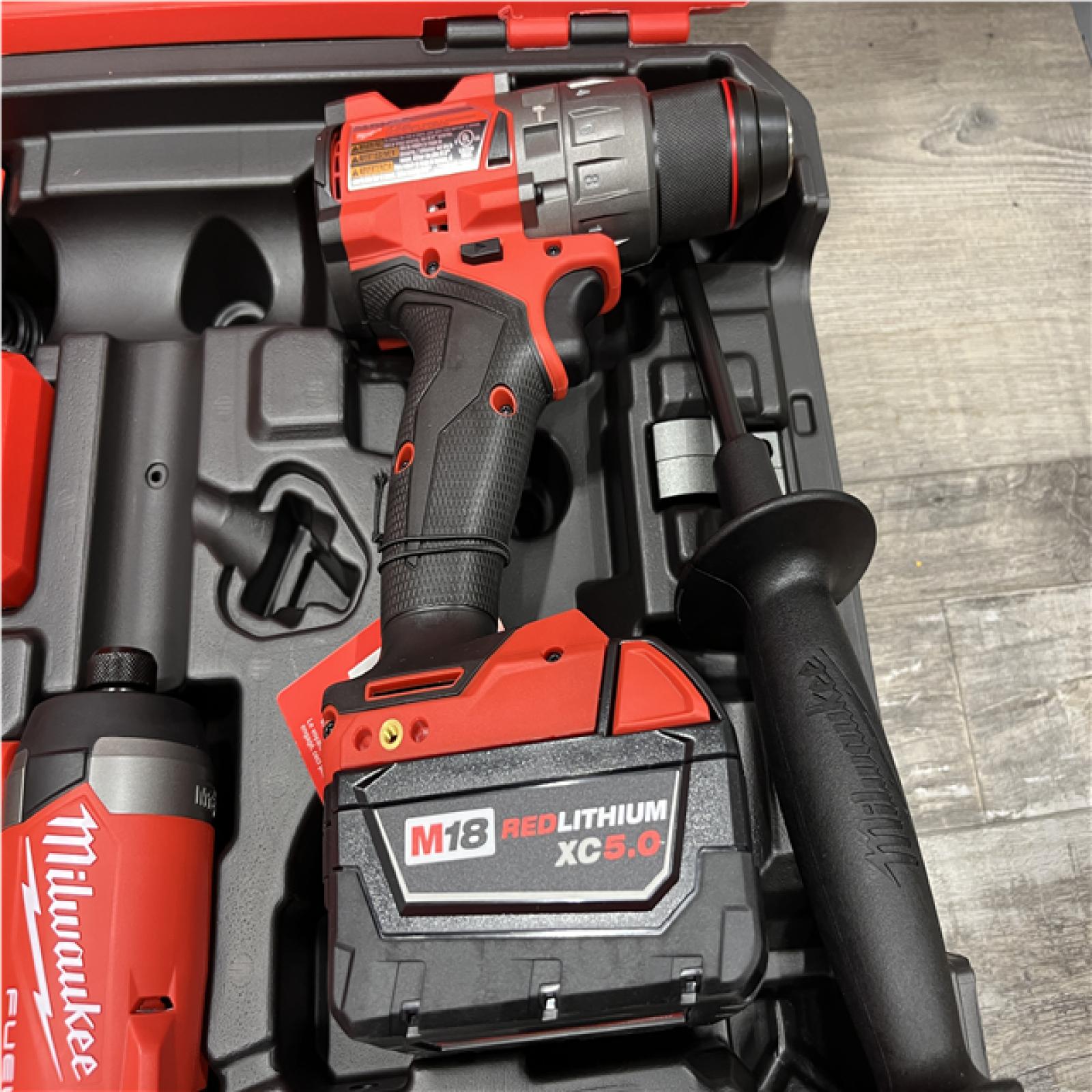 AS-IS  Milwaukee FUEL 18V Lithium-Ion Brushless Cordless Hammer Drill and Impact Driver Combo Kit