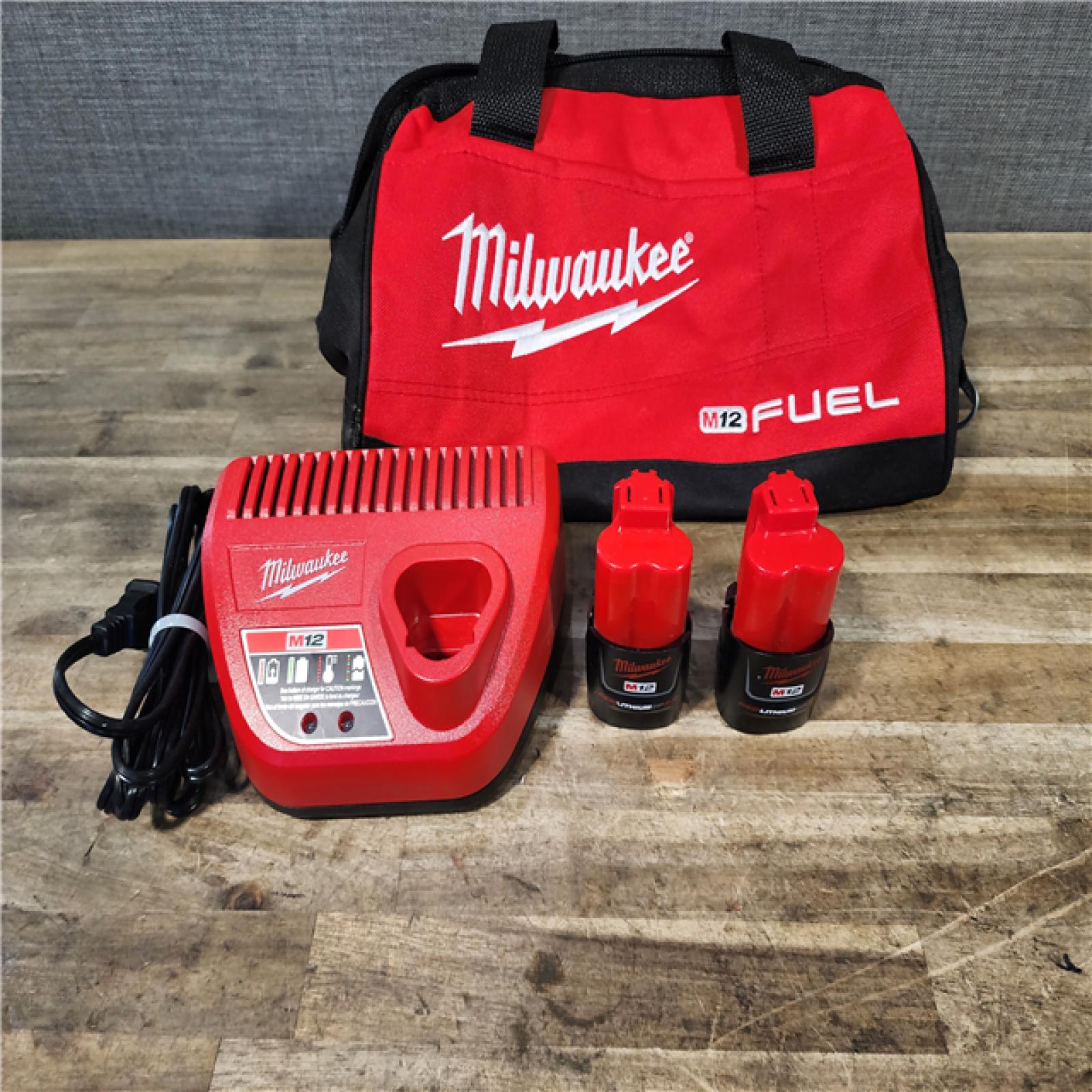 HOUSTON LOCATION - AS-IS Milwaukee FUEL 12-Volt Lithium-Ion Brushless Cordless Hammer Drill and Impact Driver Combo Kit