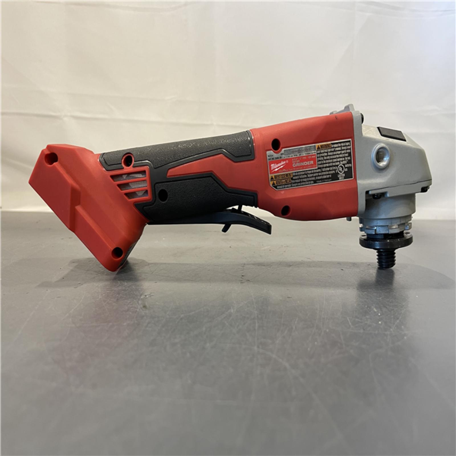 AS-IS - Milwaukee 18V Cordless 4.5 /5  Grinder W/ Paddle Switch (Tool Only)