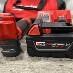 AS-IS Milwaukee FUEL 18V Cordless Mid Torque 1/2 in. Impact Wrench w/ 12 FUEL 3/8 in. Ratchet Combo Kit