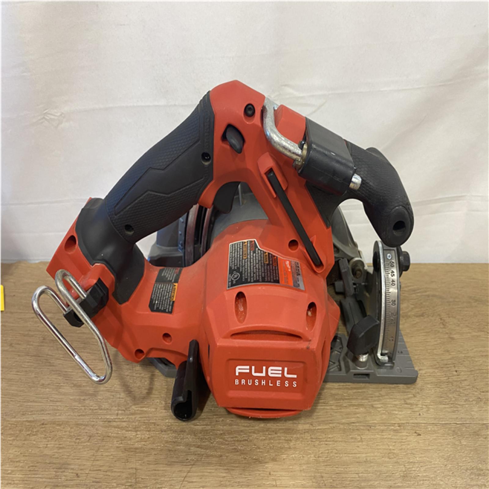 AS-IS Milwaukee FUEL 18V Lithium-Ion Brushless Cordless 6-1/2 in. Circular Saw (Tool-Only)