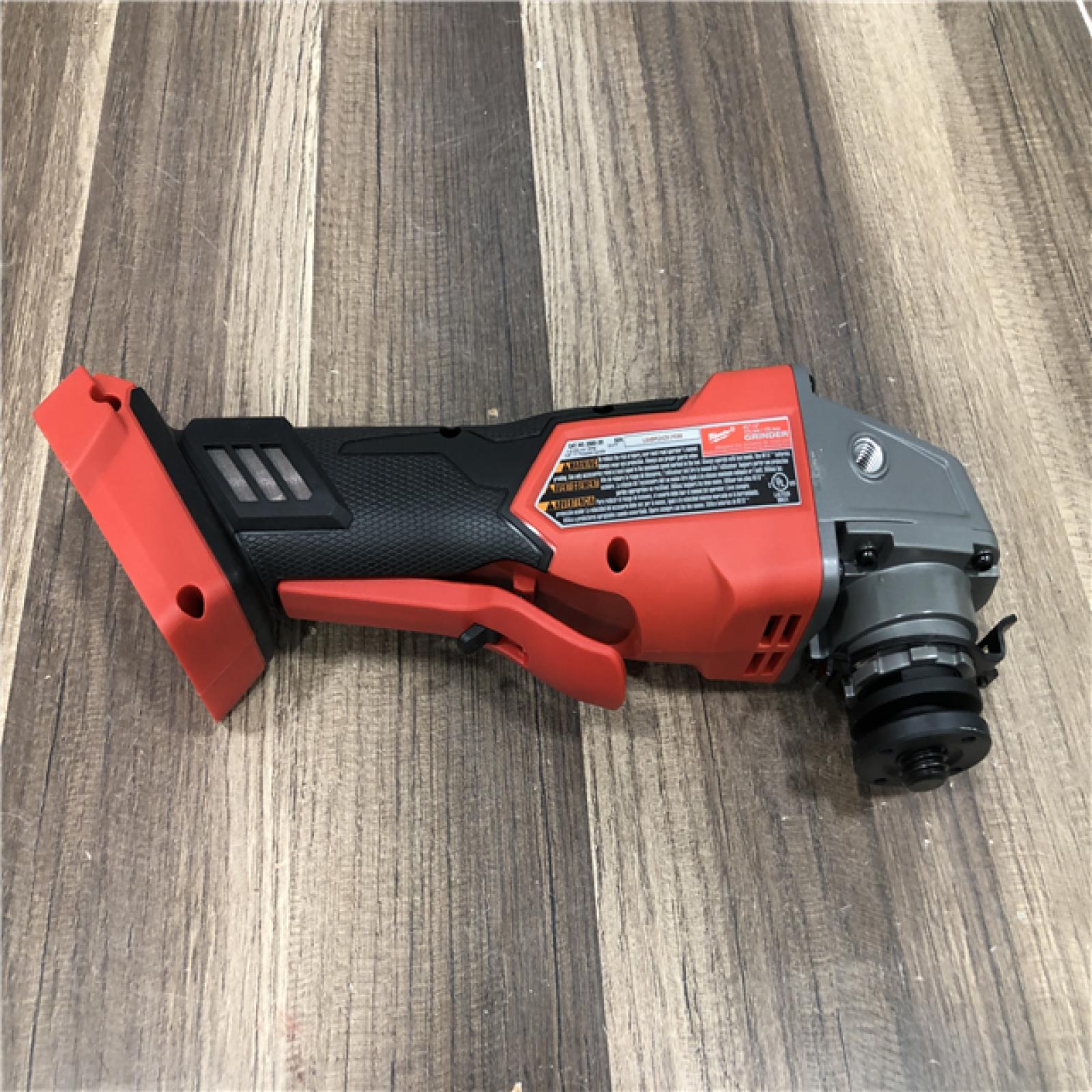 AS-IS Milwaukee FUEL 18V Lithium-Ion Brushless Cordless 4-1/2 in./5 in. Grinder w/Paddle Switch (Tool-Only)