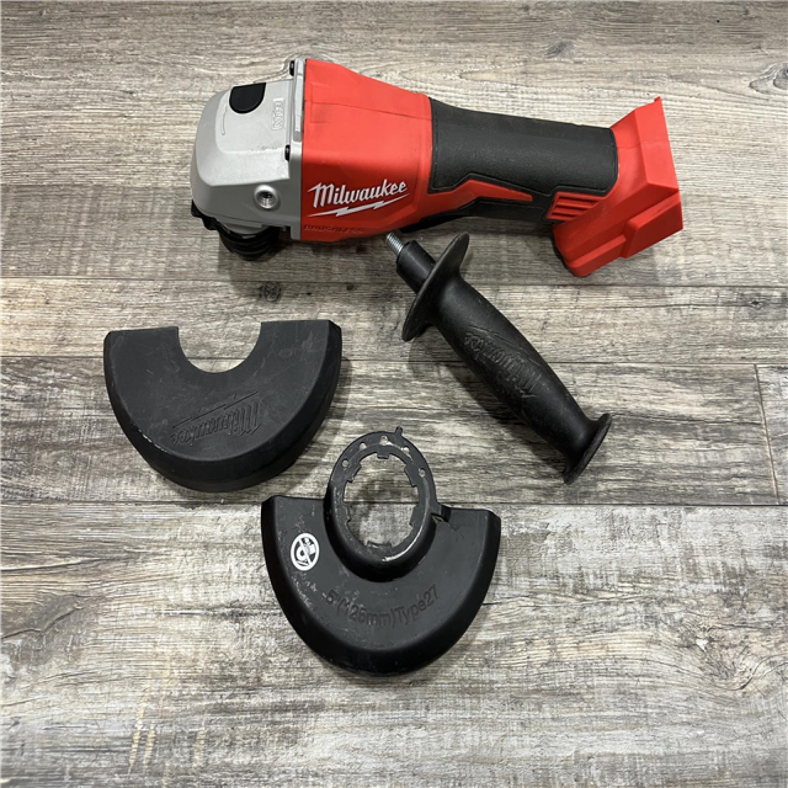AS-IS Milwaukee 18V Lithium-Ion Brushless Cordless 4-1/2 in./5 in. Grinder w/Paddle Switch (Tool-Only)