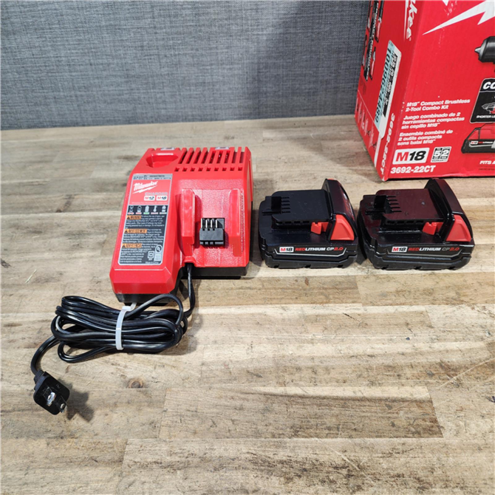 HOUSTON LOCATION - AS-IS Milwaukee M18 18V Lithium-Ion Brushless Cordless Compact Drill/Impact Combo Kit (2-Tool) W/(2) 2.0 Ah Batteries  Charger & Bag
