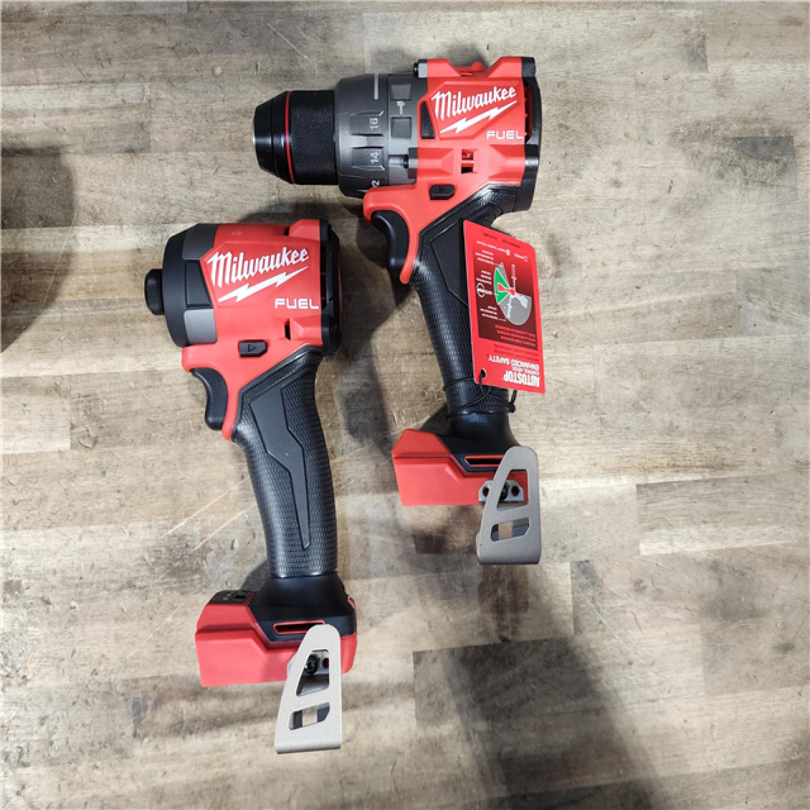 HOUSTON LOCATION - AS-IS (APPEARS LIKE NEW) Milwaukee M18 FUEL 18V Lithium-Ion Brushless Cordless Hammer Drill and Impact Driver Combo Kit