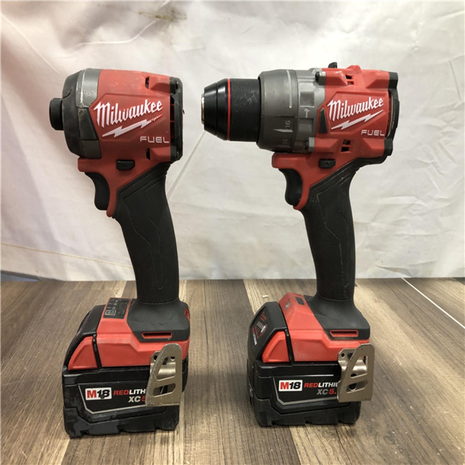 AS-IS Milwaukee FUEL 18V Lithium-Ion Brushless Cordless Hammer Drill and Impact Driver Combo Kit