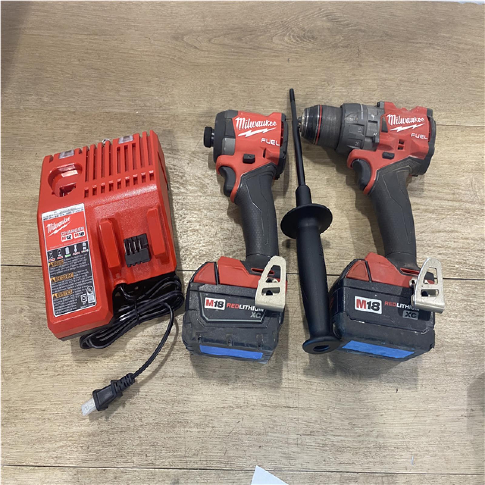 AS-IS Milwaukee FUEL 18V Lithium-Ion Brushless Cordless Hammer Drill and Impact Driver Combo Kit