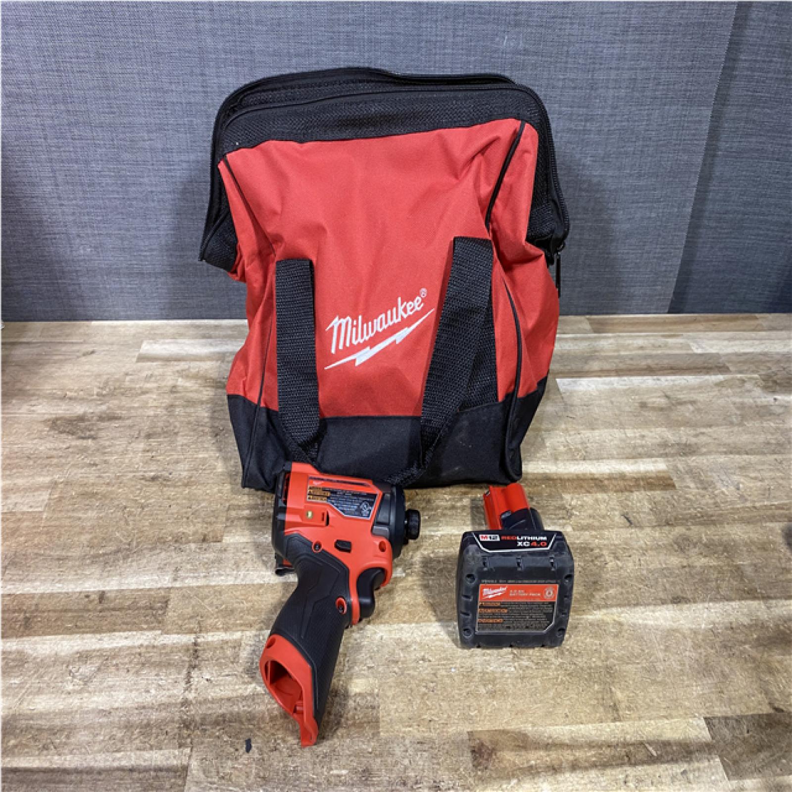 Houston Location AS-IS Milwaukee FUEL 12V Lithium-Ion Brushless Cordless 1/4 in. Hex Impact Driver and Battery