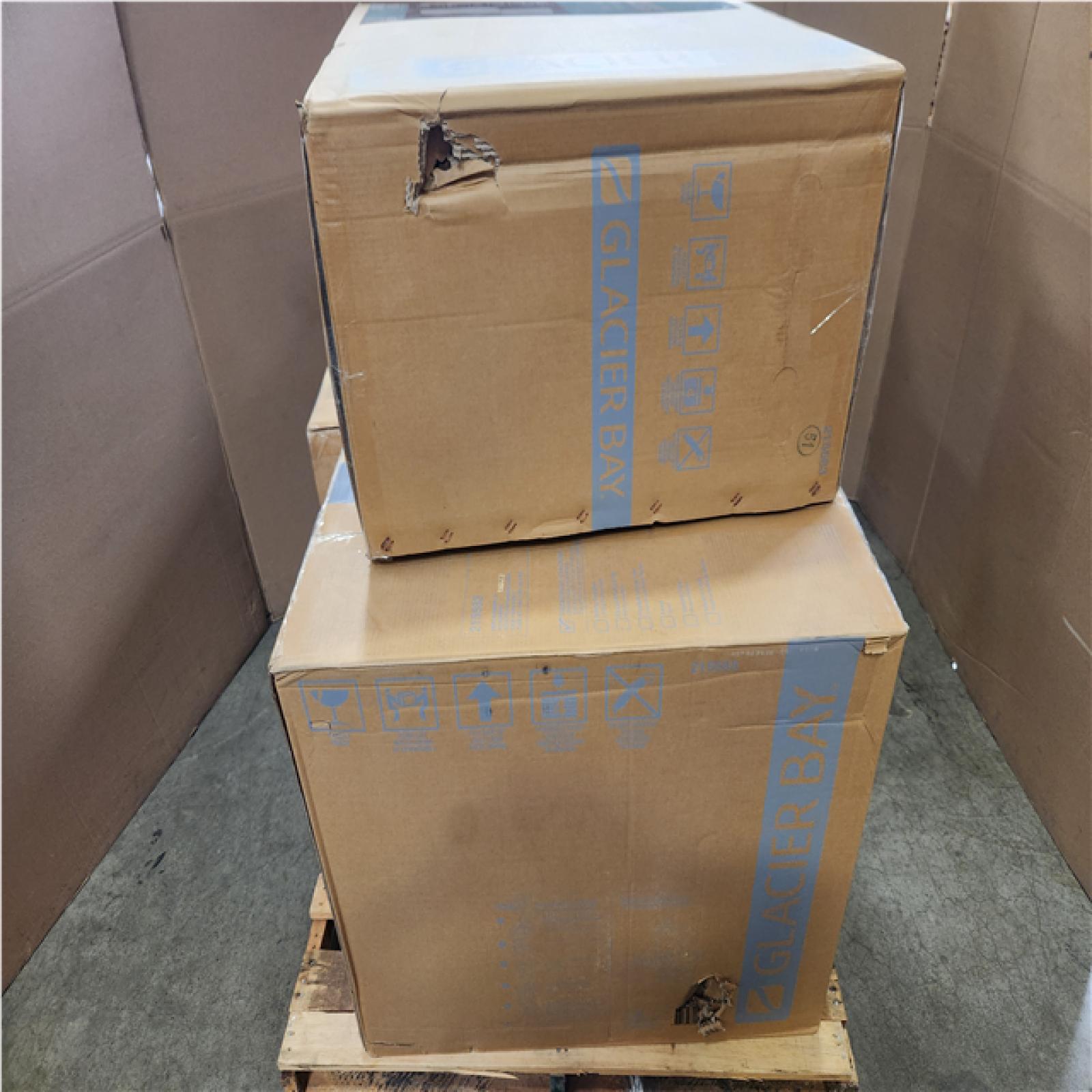 Phoenix NEW Glacier Bay 12 in. Rough In 2-Piece 1.0 GPF/1.28 GPF Dual Flush Elongated Toilet in White, Seat Included Pallet of 4