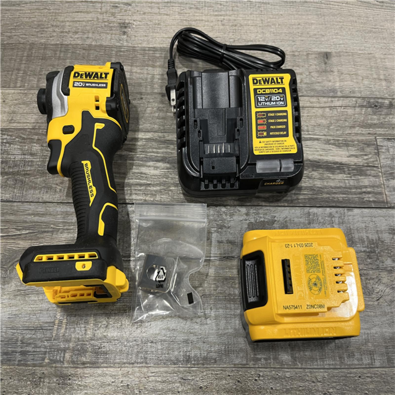 AS-IS DEWALT ATOMIC 20V MAX Lithium-Ion Cordless 1/4 in. Brushless Impact Driver Kit