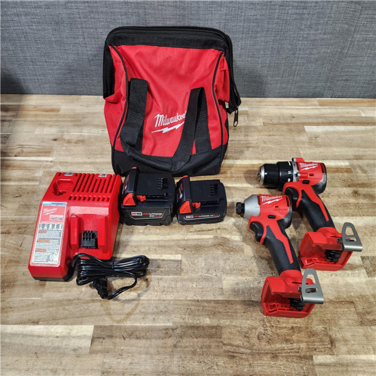 HOUSTON LOCATION - AS - IS Milwaukee 18-Volt Lithium-Ion Brushless Cordless Compact Hammer Drill/Impact Combo Kit