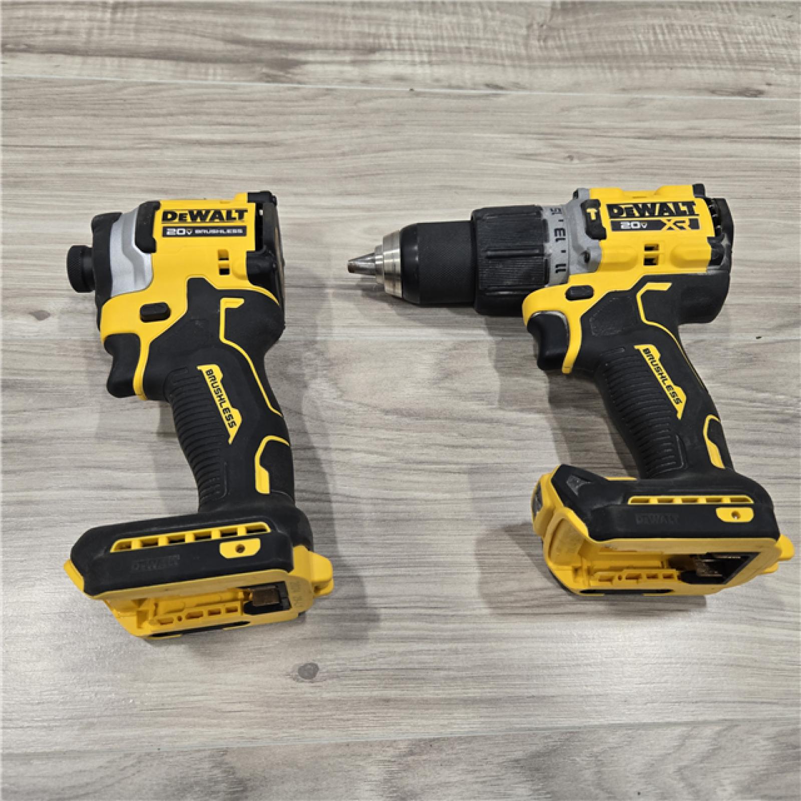 AS-IS DEWALT 20V MAX XR Hammer Drill and ATOMIC Impact Driver 2 Tool Cordless Combo Kit with (2) 4.0Ah Batteries, Charger, and Bag