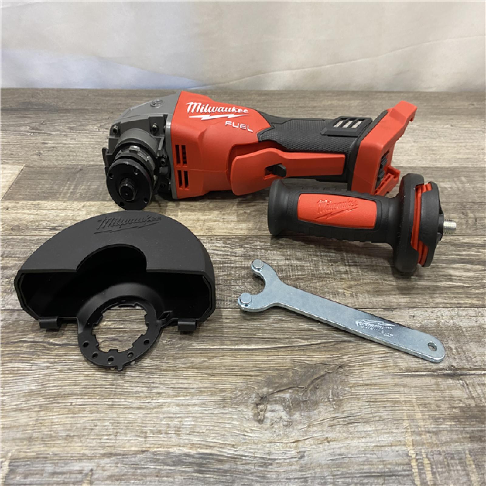 AS-IS Milwaukee FUEL 18V Lithium-Ion Brushless Cordless 4-1/2 in./5 in. Grinder w/Paddle Switch (Tool-Only)